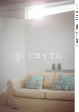 Sofa against wall at home 134101256