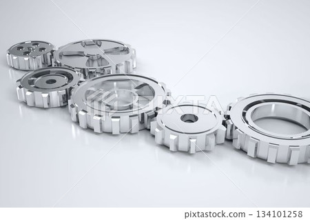 Six silver gears are aligning diagonally with varying diameters in 3D render on light-gray surface 134101258