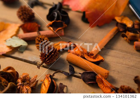 Close-up of cinnamons and dried fruits 134101362
