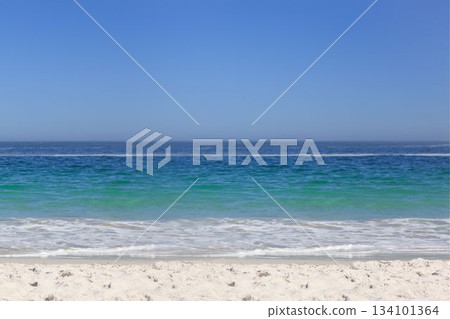 Seascape is unfolding in flat design with pale sand, translucent water, gentle waves 134101364