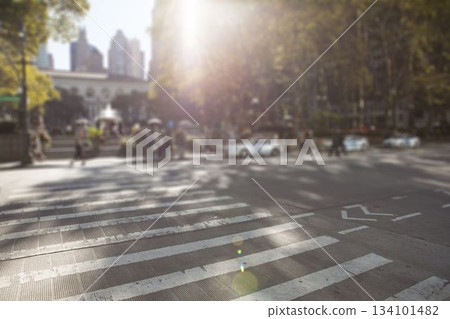 Wide pedestrian crosswalk is spanning urban street in flat design, with fountain and cars Wide pedestrian crosswalk is spanning urban street in flat design, with fountain and cars 134101482