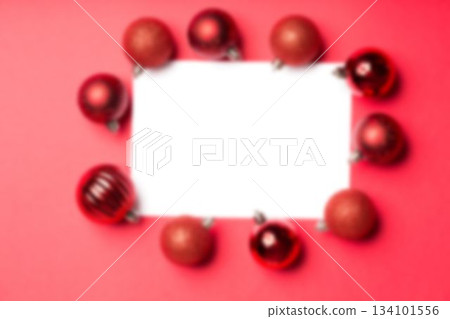 White page surrounded by christmas baubles White page surrounded by christmas baubles 134101556
