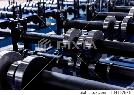 Metal sheet forming machine at the modern metalwork factory. Metal sheet forming machine at the modern metalwork factory. 134102676