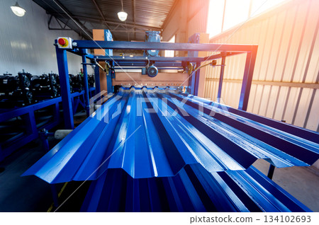 Metal sheet forming machine at the modern metalwork factory. Metal sheet forming machine at the modern metalwork factory. 134102693