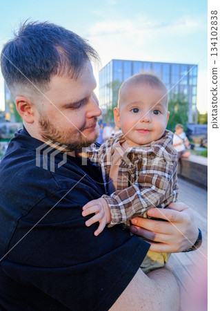 Father and Baby Smiling Outdoors Father and Baby Smiling Outdoors 134102838