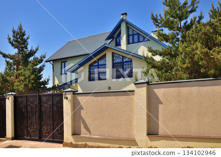 A Modern private house behind the fence 134102946
