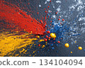 Abstract vibrant multicolor wet paint splash of drops on blue background 134104094
