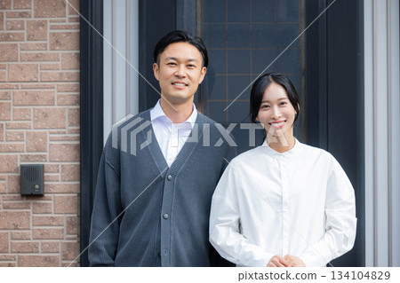 A couple in the living room A couple in the living room 134104829