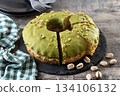 Slice of pistachio cake 134106132