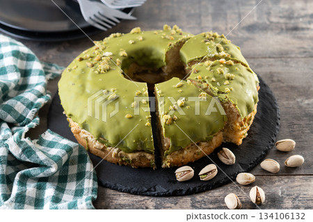 Slice of pistachio cake Slice of pistachio cake 134106132