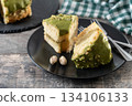 Slice of pistachio cake 134106133