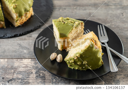 Slice of pistachio cake Slice of pistachio cake 134106137