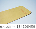 Brown envelope on a white background 134106459