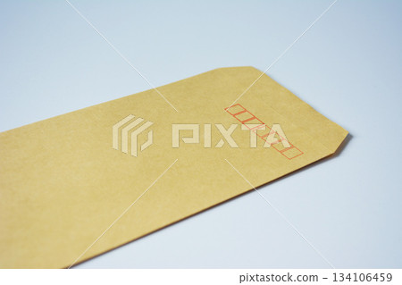 Brown envelope on a white background Brown envelope on a white background 134106459