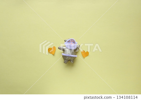 Santa Claus on a yellow background with a hearts. Santa Claus on a yellow background with a hearts. 134108114
