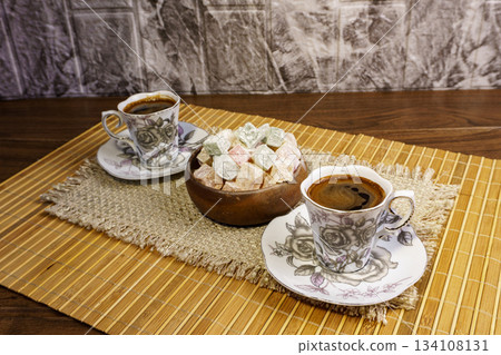 Two cups of turkish coffee and rahat lokum 134108131