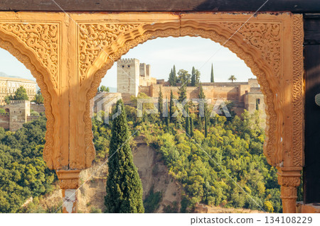 View of Alhambra palace through ornate archway, Granada Spain View of Alhambra palace through ornate archway, Granada Spain 134108229