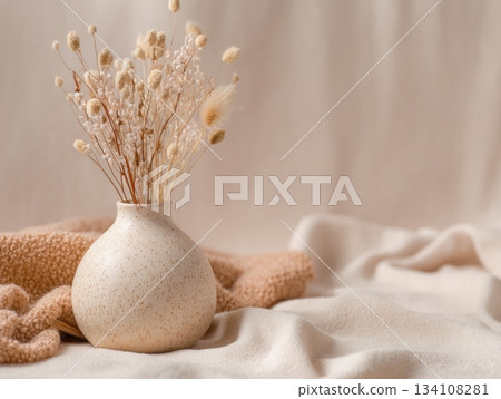 Cozy minimal composition with ceramic vase and dried flowers 134108281