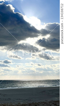 Sunlight pouring through the clouds 134108712