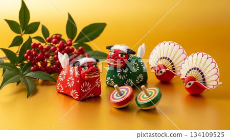 New Year's decorations of lion dance and spinning tops on a golden background New Year's decorations of lion dance and spinning tops on a golden background 134109525