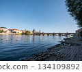 The Charles Bridge crossing the Vltava River in Prague, Czech Republic.  134109892