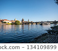 The Charles Bridge crossing the Vltava River in Prague, Czech Republic.  134109899