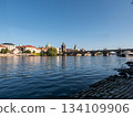 The Charles Bridge crossing the Vltava River in Prague, Czech Republic.  134109906