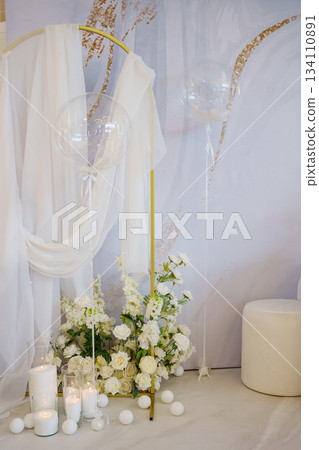 Elegant ceremony backdrop with white flowers and decor 134110891