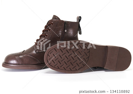 Stylish brown shoes with unique detailing for everyday wear Stylish brown shoes with unique detailing for everyday wear 134110892