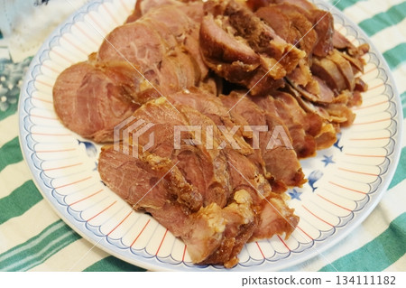 Close-up shot of sliced beef on a plate Close-up shot of sliced beef on a plate 134111182