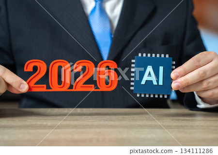 The year 2026 and an AI chip in the hands of a businessman. A year of revolutionary changes in business and industry. Tech transformation, digital strategy planning and future corporate innovation The year 2026 and an AI chip in the hands of a businessman. A year of revolutionary changes in business and industry. Tech transformation, digital strategy planning and future corporate innovation 134111286
