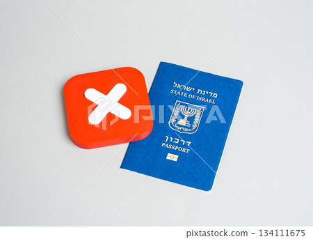 Israeli passport and the symbol of refusal. Refusal to obtain citizenship and a Israeli passport. Ban on entry of citizens into the country of arrival. 134111675