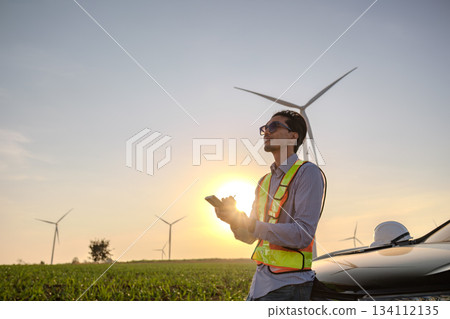 Engineer working at Wind turbine fields Engineer working at Wind turbine fields 134112135