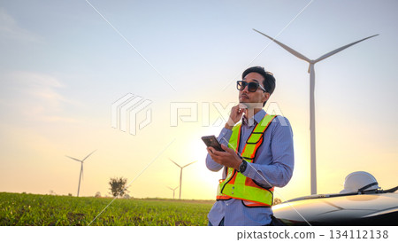 Engineer working at Wind turbine fields 134112138
