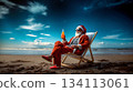 A man in a santa claus outfit sitting in a chair on the beach 134113061
