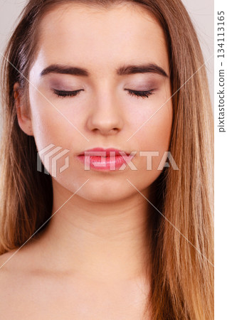 Closeup portrait of young teenager woman. 134113165