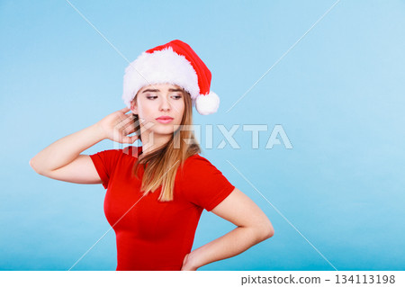 Happy woman wearing Santa Claus helper costume Happy woman wearing Santa Claus helper costume 134113198