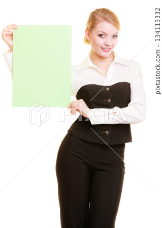 Ad. Businesswoman holding blank copy space banner 134113332