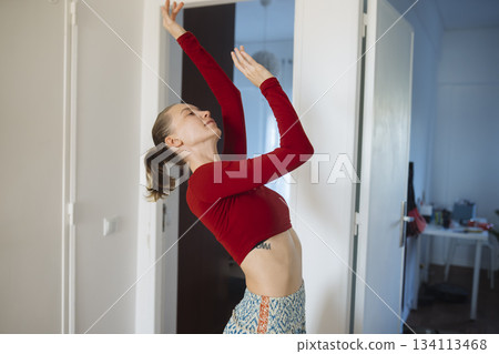 An intimate solo dance routine captured in gentle natural illumination An intimate solo dance routine captured in gentle natural illumination 134113468