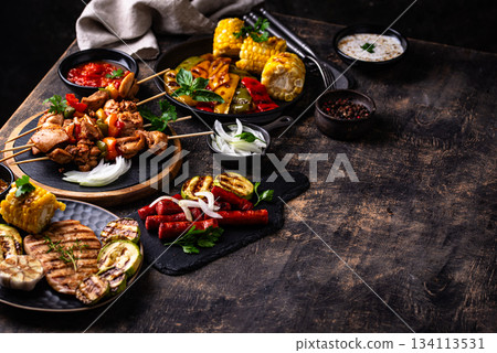 Assortment of grilled bbq meat and vegetables Assortment of grilled bbq meat and vegetables 134113531