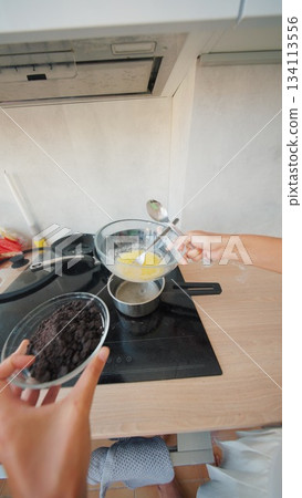Getting Ready to Prepare a Delicious and Appetizing Chocolate Dessert in a Modern Kitchen Getting Ready to Prepare a Delicious and Appetizing Chocolate Dessert in a Modern Kitchen 134113556