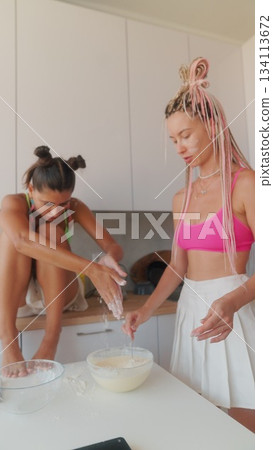 Engaging in Creative Cooking Activities Together in a Beautiful and Stylish Kitchen Space 134113672