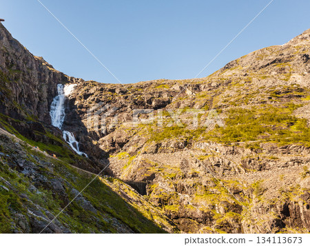 Waterfall over Trollstigen mountain road, Norway 134113673