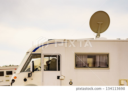Satellite dish on roof of caravan 134113698