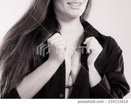 woman wearing lingerie and shirt woman wearing lingerie and shirt 134113818