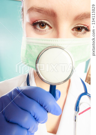 Specialist in mask with stethoscope. Specialist in mask with stethoscope. 134113829