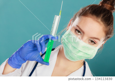 Professionalist in mask with syrigne Professionalist in mask with syrigne 134113830