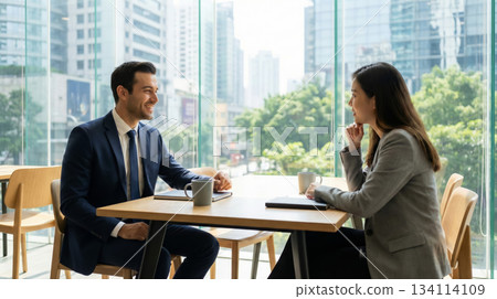 Colleagues Talk in a Meeting 134114109
