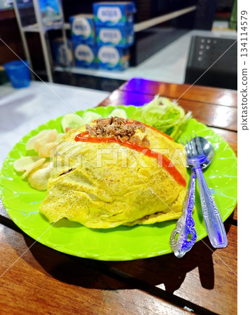 Delicious Indonesian Fried Rice Wrapped in Omelette 134114579