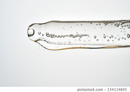 Cosmetic pipette dispensing serum with air bubbles Cosmetic pipette dispensing serum with air bubbles 134114605